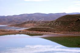 Image du Maroc Professionnelle de  Le barrage Laghrasse "dit barrage Hassan II", il se situe à 50 km au sud est de Taourirte au nord du Maroc, Samedi 10 Février 2006, ce barrage fournit en eau potable  le barrage Mohammed V qui sert de lien pour Machraa Hammadi,  ce dernier permet l'approvisionnement des centre de Taourirte et El Aïoun Sidi Mellouk. (Photo / Abdeljalil Bounhar) 